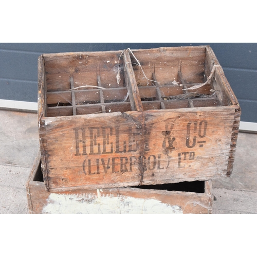 355 - A vintage Marston's of Burton upon Trent wooden beer bottle crate together with a similar example fr... 