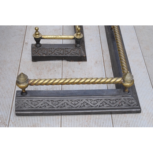 373 - A near pair of late 19th century metal and brass fire fenders, largest exteriors 145 x 50cm (2).