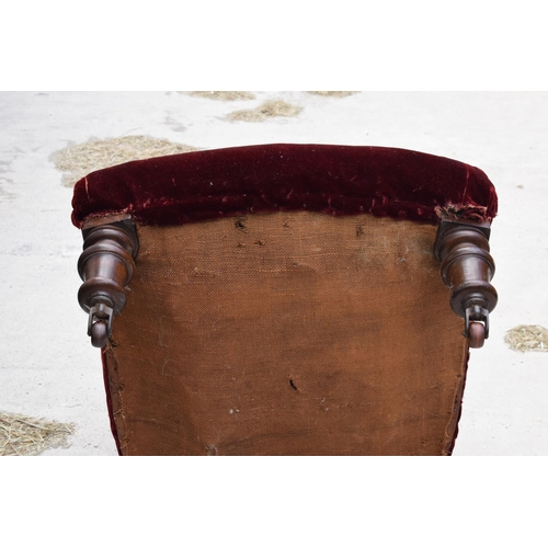 374 - 19th century upholstered mahogany button-back library-style chair, 94cm tall. In need of attention.