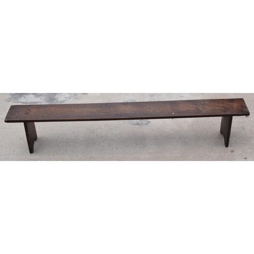 387 - Victorian oak elongated foot stool, 126cm long, 22cm tall.