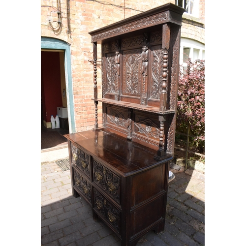 391 - 19th century dresser with carved decoration in a Jacobean manner, probably European. 120 x 56 x 202c... 