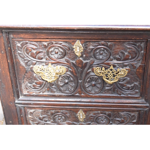 391 - 19th century dresser with carved decoration in a Jacobean manner, probably European. 120 x 56 x 202c... 