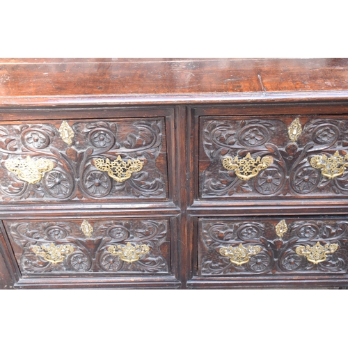 391 - 19th century dresser with carved decoration in a Jacobean manner, probably European. 120 x 56 x 202c... 