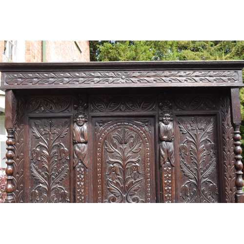 391 - 19th century dresser with carved decoration in a Jacobean manner, probably European. 120 x 56 x 202c... 