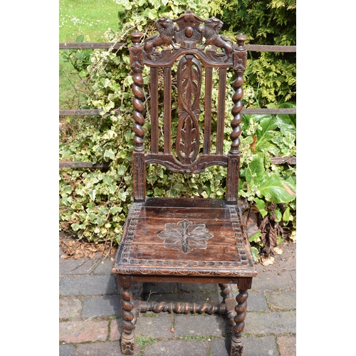 394 - Late 18th / early 19th century carved chair, gothic style, 106cm tall.