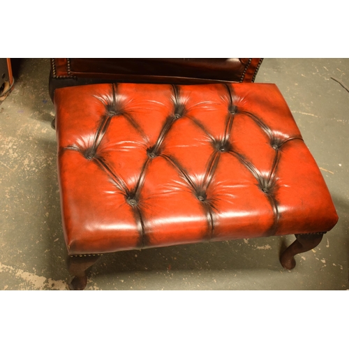 397 - Vintage button back oxblood red leather wingback Chesterfield chair together with footstool, chair 1... 