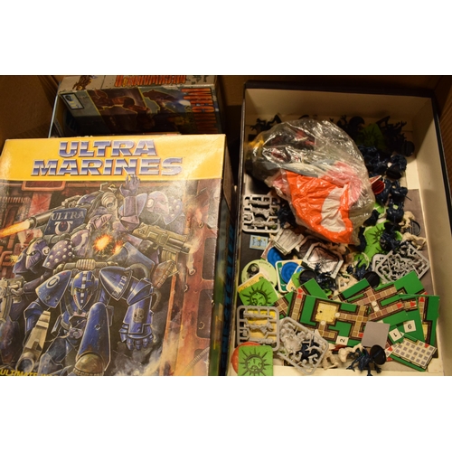 404 - A collection of toys and games to include loose Lego, Kingdom Death and loose toys in cardboard boxe... 