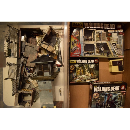 405 - A collection of toys / models to include AMC Walking Dead construction sets and other similar loose ... 