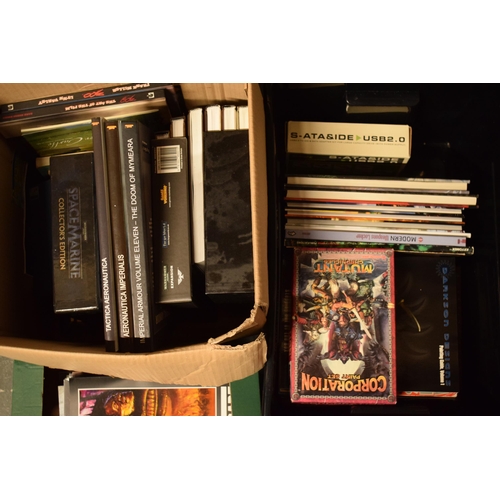 414 - A large collection of Warhammer and similar model gaming books to include guides, magazines, books a... 