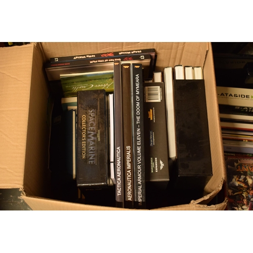 414 - A large collection of Warhammer and similar model gaming books to include guides, magazines, books a... 