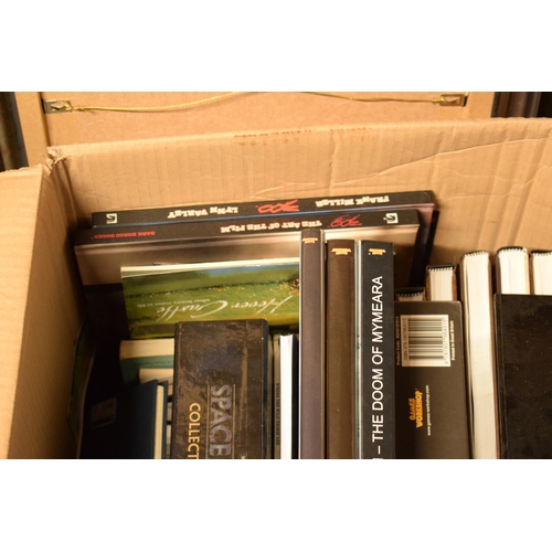 414 - A large collection of Warhammer and similar model gaming books to include guides, magazines, books a... 