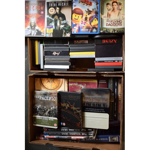 420 - A large collection of hardback books and DVDs to include The Walking Dead and Marvel books, Terry Pr... 