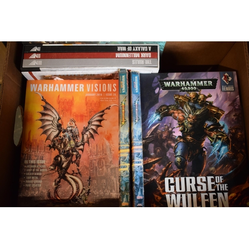 421 - A collection of mainly Warhammer books to include Warhammer Visions, Curse of the Wulfen, Warhammer ... 