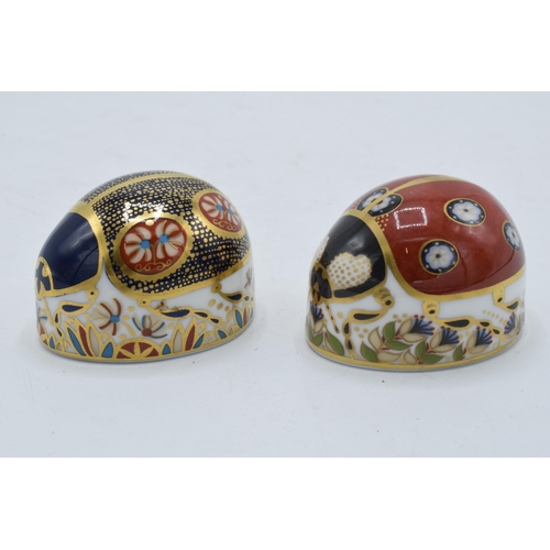 44 - Boxed Royal Crown Derby paperweights Red Ladybird with seven spots and a Blue Ladybird with 4 spots ... 