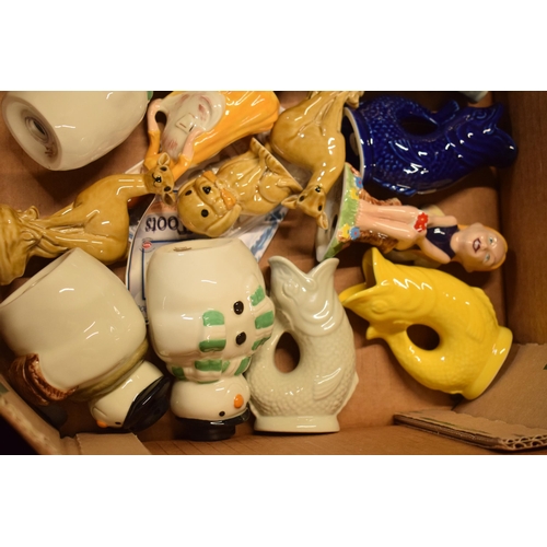 50 - A collection of Wade items to include gargle fish jugs, Collectania, snowmen cruets, Christmas 1998 ... 