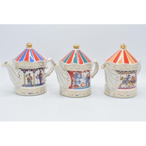 54 - A trio of Sadler teapots to include Band Stand, Circus and Carousel (3).