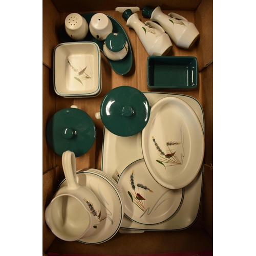 61 - A large collection of Denby Stoneware Greenwheat tea and dinner ware to include bowls, plates, tea p... 