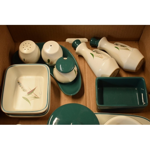 61 - A large collection of Denby Stoneware Greenwheat tea and dinner ware to include bowls, plates, tea p... 