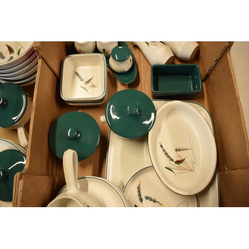 61 - A large collection of Denby Stoneware Greenwheat tea and dinner ware to include bowls, plates, tea p... 