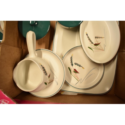 61 - A large collection of Denby Stoneware Greenwheat tea and dinner ware to include bowls, plates, tea p... 