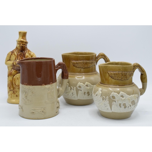 66 - A collection of late 19th century two-tone stoneware jugs with traditional scenes together with '183... 