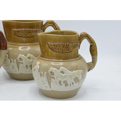 66 - A collection of late 19th century two-tone stoneware jugs with traditional scenes together with '183... 