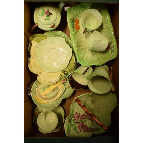 68 - A large quantity of Carlton Ware pottery to include leaf dishes, cabbage ware items and other simila... 