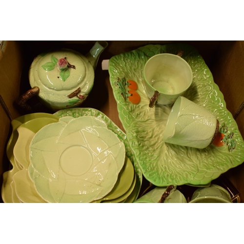 68 - A large quantity of Carlton Ware pottery to include leaf dishes, cabbage ware items and other simila... 