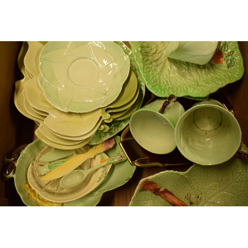 68 - A large quantity of Carlton Ware pottery to include leaf dishes, cabbage ware items and other simila... 