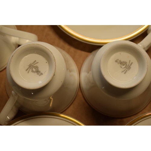 70 - 6 x Royal Doulton cups and saucers in the Gold Concord design H5049 (12) (mostly seconds).