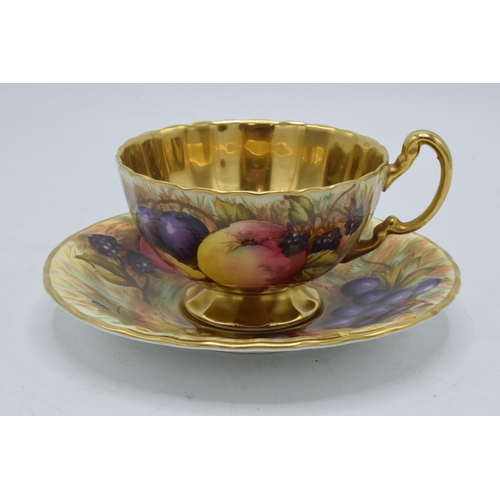 72 - Aynsley Orchard Gold cup and saucer with gold detailing and interior, signed N Brunt, cup af (2).