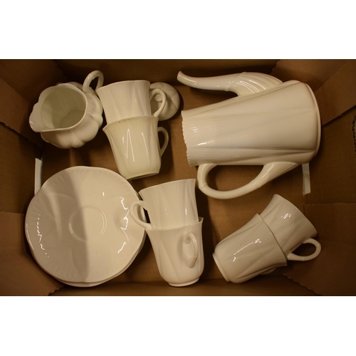 74 - A collection of Shelley white glaze coffee set in the 'Dainty' shape to include a coffee pot, milk j... 