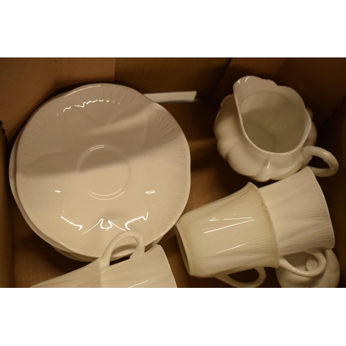 74 - A collection of Shelley white glaze coffee set in the 'Dainty' shape to include a coffee pot, milk j... 