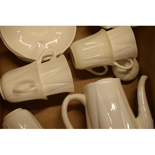 74 - A collection of Shelley white glaze coffee set in the 'Dainty' shape to include a coffee pot, milk j... 