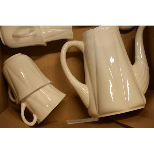 74 - A collection of Shelley white glaze coffee set in the 'Dainty' shape to include a coffee pot, milk j... 