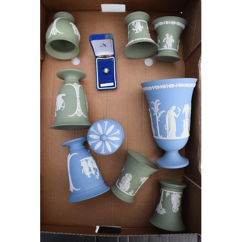 75 - A collection of Wedgwood Jasperware in varying colours to include Sage Green and Black to consist of... 