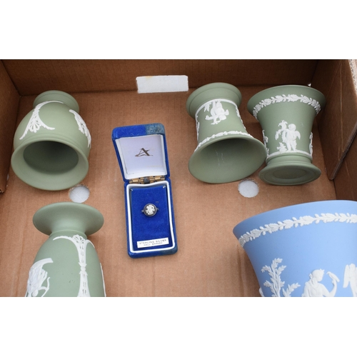 75 - A collection of Wedgwood Jasperware in varying colours to include Sage Green and Black to consist of... 