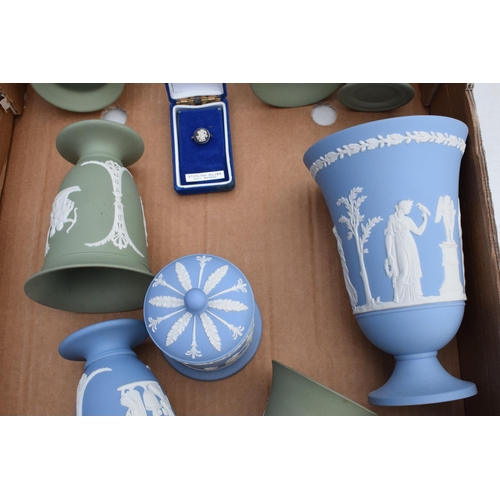 75 - A collection of Wedgwood Jasperware in varying colours to include Sage Green and Black to consist of... 