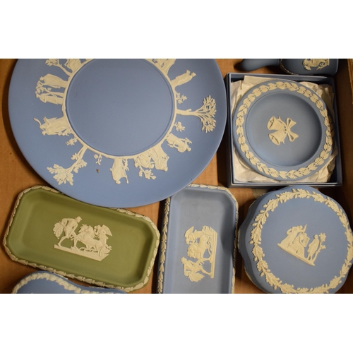 83 - A collection of Wedgwood Jasperware to include light blue and sage green consisting of plates, trink... 