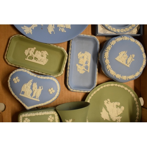 83 - A collection of Wedgwood Jasperware to include light blue and sage green consisting of plates, trink... 