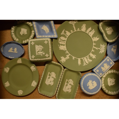 84 - A collection of Wedgwood Jasperware to include light blue and sage green consisting of plates, trink... 