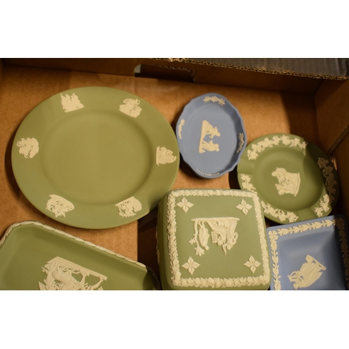 84 - A collection of Wedgwood Jasperware to include light blue and sage green consisting of plates, trink... 