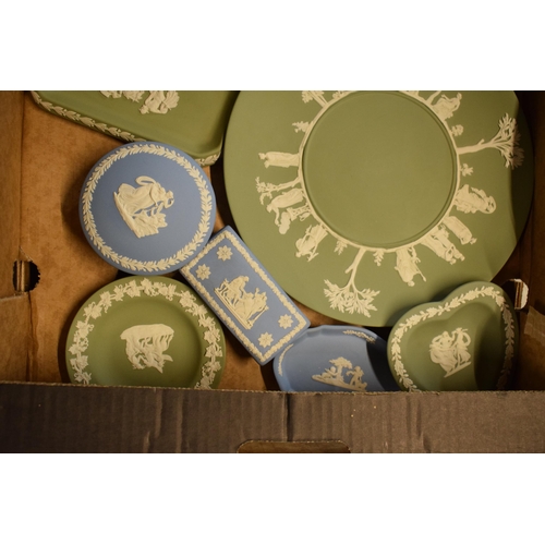 84 - A collection of Wedgwood Jasperware to include light blue and sage green consisting of plates, trink... 