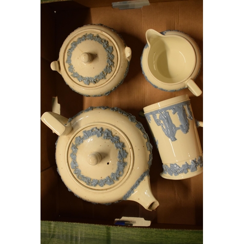 88A - Wedgwood blue and white Queensware items to include a teapot, lidded sugar, milk jug and creamer (4)... 