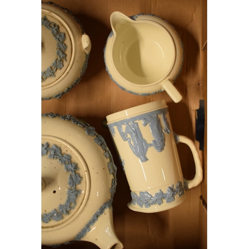 88A - Wedgwood blue and white Queensware items to include a teapot, lidded sugar, milk jug and creamer (4)... 