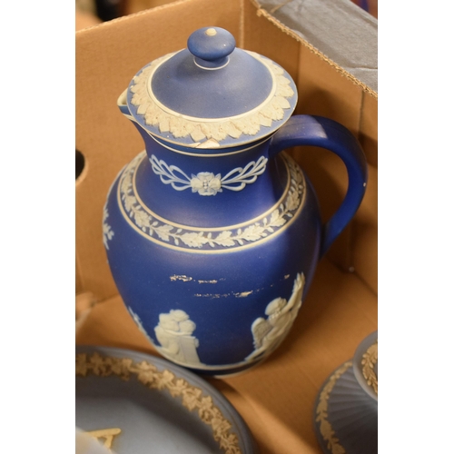 90 - A collection of Wedgwood Jasperware to include vases, trinkets, a tankard, a plaque and much more ma... 