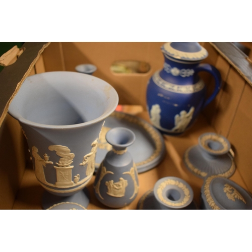 90 - A collection of Wedgwood Jasperware to include vases, trinkets, a tankard, a plaque and much more ma... 