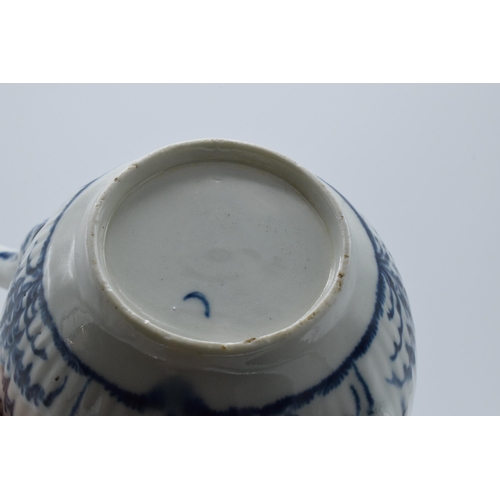 101 - A late 18th / early 19th century blue and white pottery teapot with crescent mark to base, 12.5cm ta... 