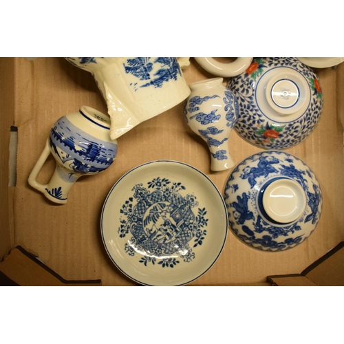 104 - A mixed collection of pottery to include 19th century blue and white Caughley-style jug, oriental te... 