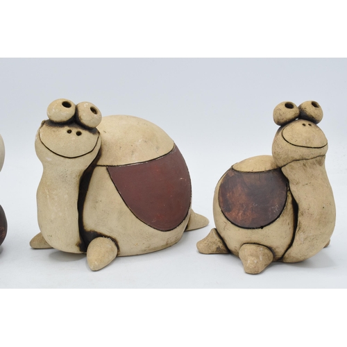 19 - A trio of John Hughes pottery Groggs to include a caterpillar and two tortoises (3). All marked. Tal... 